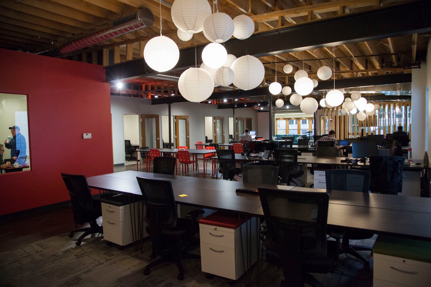 Atrium open office with hanging lights